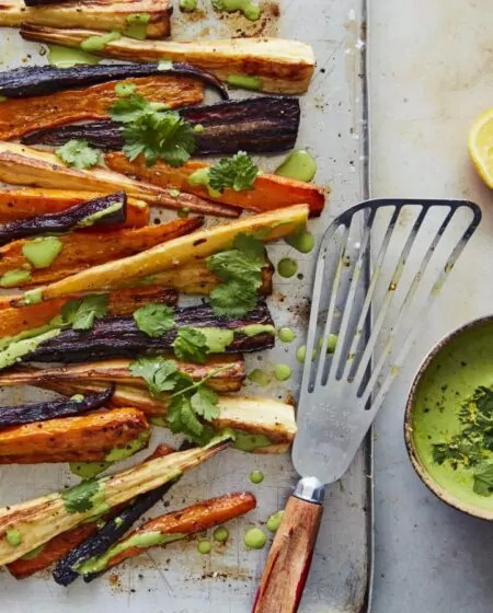 Roasted Parsnips and Carrots with Cumin and Green Tahini Dressing Recipe